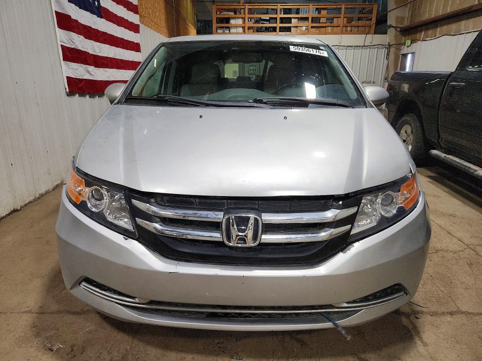 2014 Honda Odyssey VIN 5FNRL5H64EB080237 COPART salvage auction — FRONT END, AK - CERT OF VEH TITLE-RECONSTRUCTE, sold $750 on 2026-07-21 (photo 5)