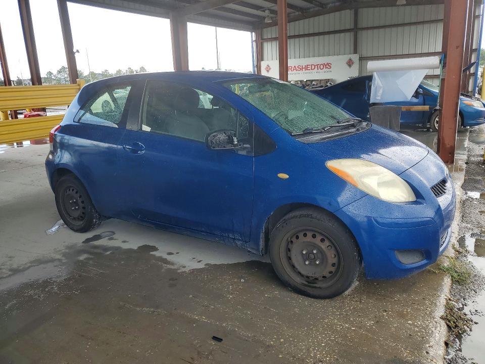 2010 Toyota Yaris VIN JTDJT4K33A5288689 COPART salvage auction — SIDE, Fl - Cert Of Title Slvg Rebuildable, sold $850 on 2026-07-06 (photo 4)