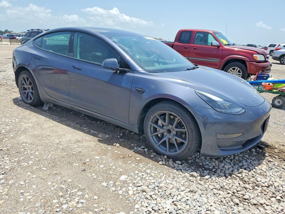 2023 Tesla Model 3 VIN 5YJ3E1EA3PF585271 COPART salvage auction — REAR END, Tx - Salvage Vehicle Title, sold $8,800 on 2026-09-02 (photo 4)