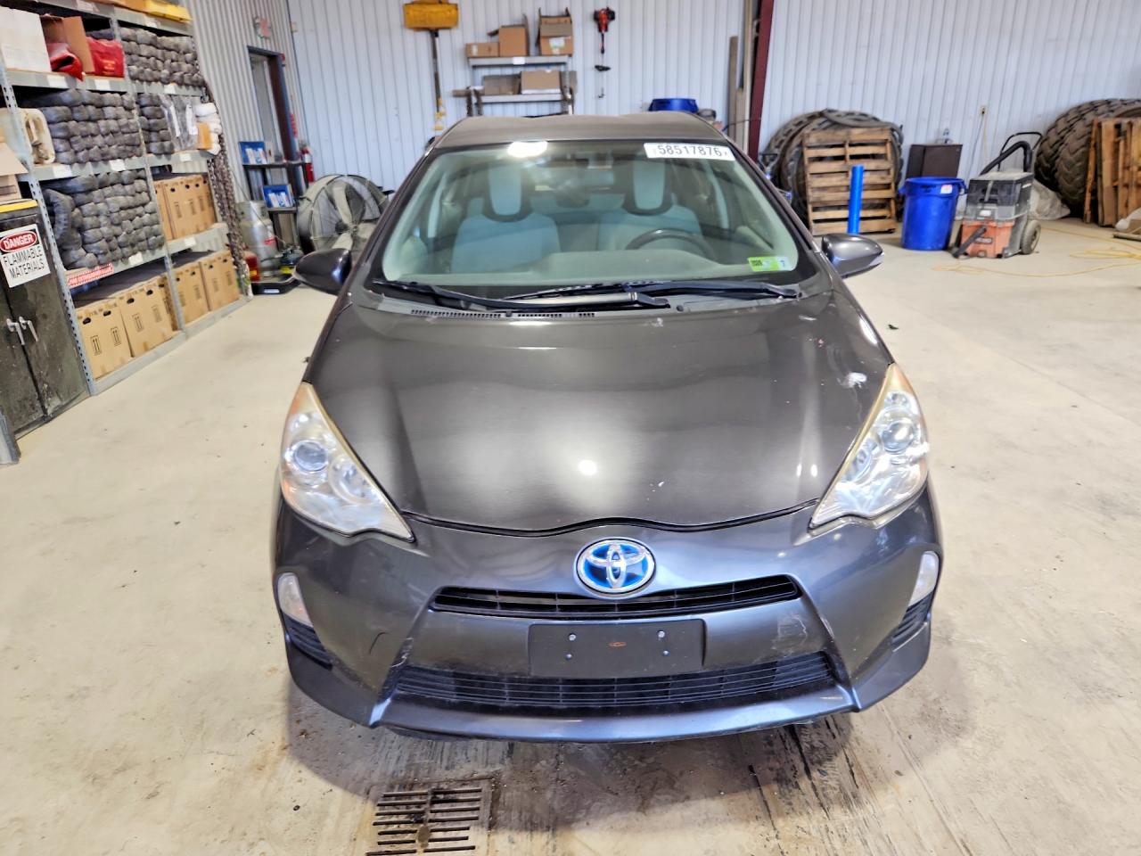 2014 Toyota Prius C VIN JTDKDTB30E1067916 COPART salvage auction — Mechanical, WV - CERTIFICATE OF TITLE, sold $1,500 on 2026-07-07 (photo 5)