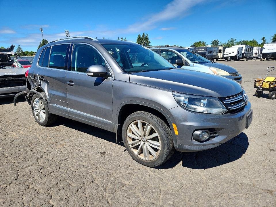 2014 Volkswagen Tiguan VIN WVGBV3AX7EW559231 COPART salvage auction — REAR END, Or - Salvage Title Certificate, sold $1,450 on 2026-07-27 (photo 4)
