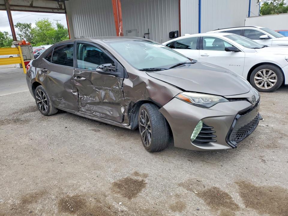 2019 Toyota Corolla VIN 5YFBURHE8KP904883 COPART salvage auction — SIDE, Fl - Cert Of Title Slvg Rebuildable, sold $2,600 on 2026-07-28 (photo 4)