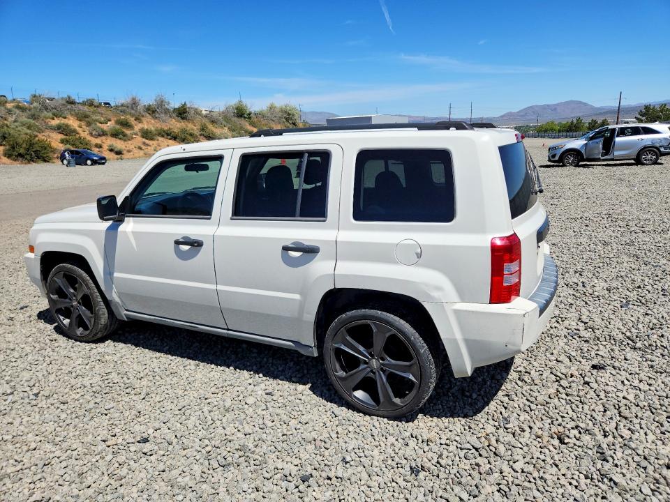 2010 Jeep Liberty (patriot) VIN 1J4NT1GA9AD624675 COPART salvage auction — SIDE, Nv - Salvage Title, sold $500 on 2026-08-20 (photo 2)