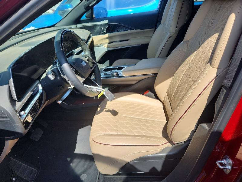 2024 Cadillac Lyriq VIN 1GYKPWRL4RZ135022 COPART salvage auction — ALL OVER, Tx - Salvage Vehicle Title, sold $13,300 on 2026-08-21 (photo 7)