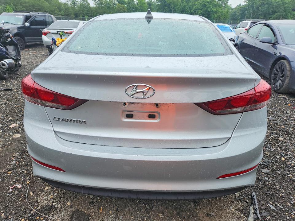 2018 Hyundai Elantra VIN KMHD84LF1JU466060 COPART salvage auction — MINOR DENT/SCRATCHES, MD - CERT OF TITLE-REBUILT SALVAGE, sold $2,450 on 2026-07-17 (photo 6)
