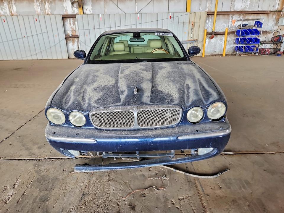 2006 Jaguar Xj series VIN SAJWA79B66SH07514 COPART salvage auction — MINOR DENT/SCRATCHES, Az - Certificate Of Title, sold $500 on 2026-07-06 (photo 5)