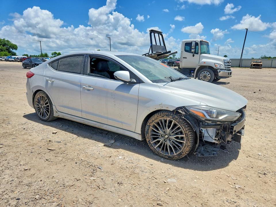 2018 Hyundai Elantra VIN KMHD04LB7JU522927 COPART salvage auction — WATER/FLOOD, Tx - Salvage Title-Flood Damage, sold $60 on 2026-07-29 (photo 4)