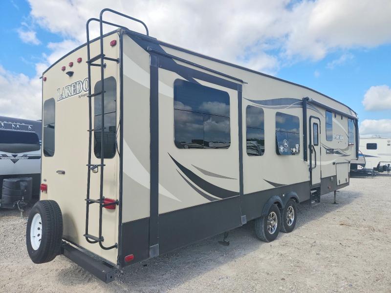 2017 Keystone Laredo VIN 4YDF34224HE601687 COPART salvage auction — HAIL, TX - CERTIFICATE OF TITLE, sold $17,800 on 2026-08-18 (photo 4)