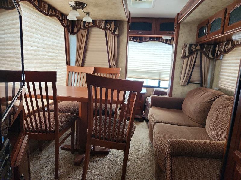 2012 Keystone Cougar VIN 4YDF28S27C2504522 COPART salvage auction — SIDE, MO - SALVAGE CERTIFICATE OF TITLE, sold $2,250 on 2026-07-30 (photo 6)