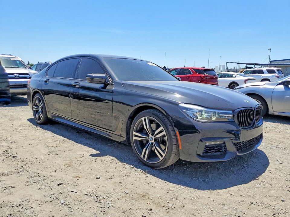 2016 BMW 7 series VIN WBA7E2C58GG547440 COPART salvage auction — SIDE, CA - SALVAGE CERTIFICATE, sold $8,800 on 2026-07-21 (photo 4)