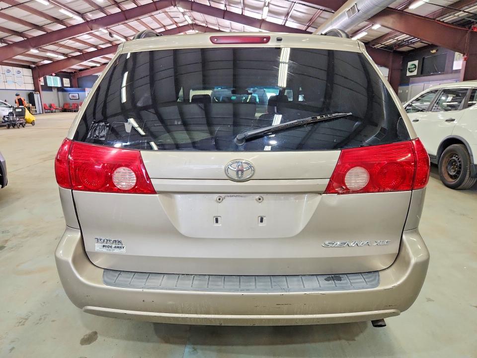 2007 Toyota Sienna VIN 5TDZK22C47S030467 COPART salvage auction — MINOR DENT/SCRATCHES, NH - CERT OF TITLE-REBUILT VEHICLE, sold $2,900 on 2026-07-27 (photo 6)