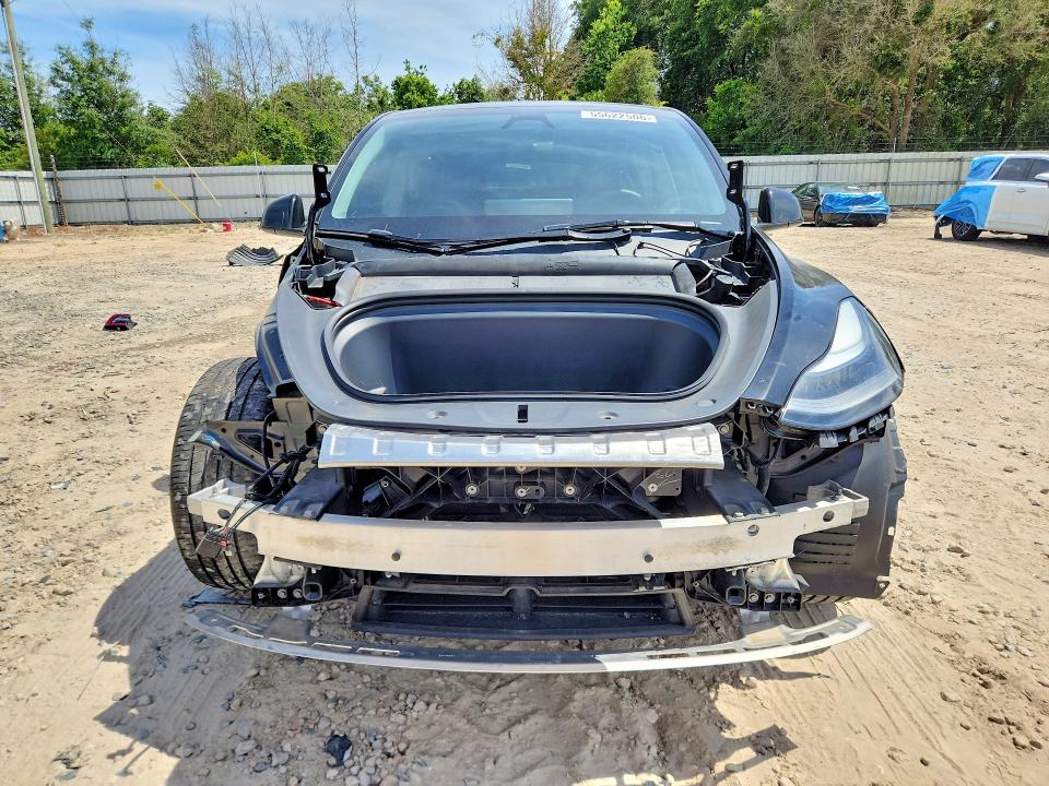 2024 Tesla Model y VIN 7SAYGDEE1RA215900 COPART salvage auction — FRONT END, Fl - Cert Of Title Slvg Rebuildable, sold $11,400 on 2026-07-17 (photo 5)