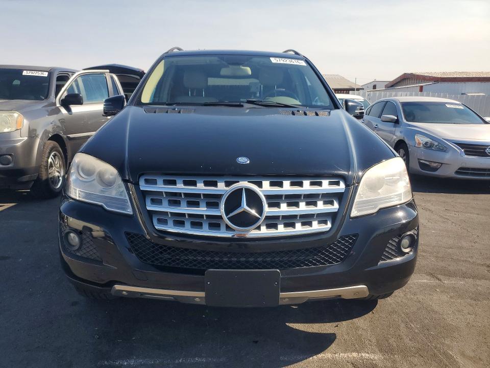 2011 Mercedes-benz Ml-class VIN 4JGBB8GBXBA687750 COPART salvage auction — MINOR DENT/SCRATCHES, Fl - Certificate Of Title, sold $1,550 on 2026-08-03 (photo 5)