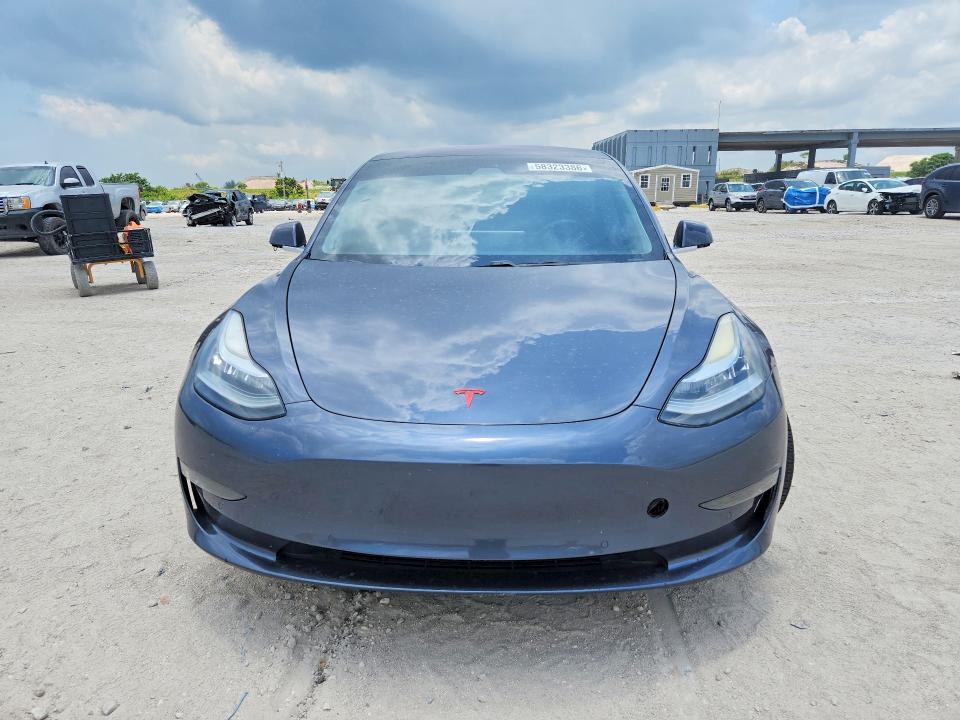 2018 Tesla Model 3 VIN 5YJ3E1EA1JF009525 COPART salvage auction — MINOR DENT/SCRATCHES, Fl - Certificate Of Title, sold $6,200 on 2026-07-07 (photo 5)