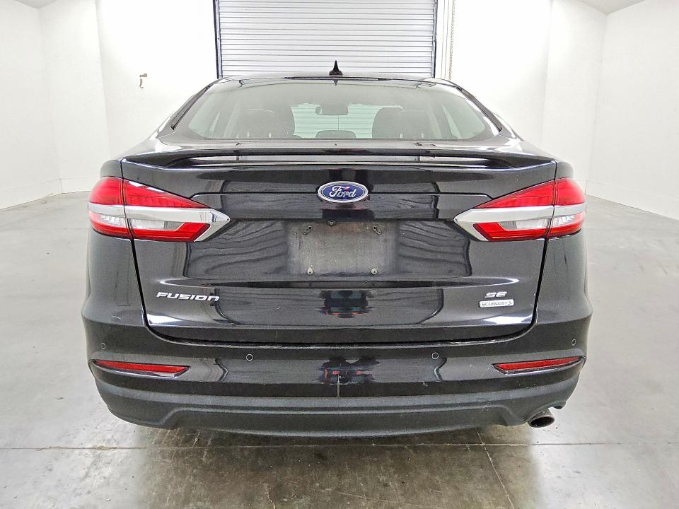 2019 Ford Fusion VIN 3FA6P0HD6KR147915 COPART salvage auction — MINOR DENT/SCRATCHES, Tx - Certificate Of Title, sold $2,850 on 2026-07-02 (photo 6)