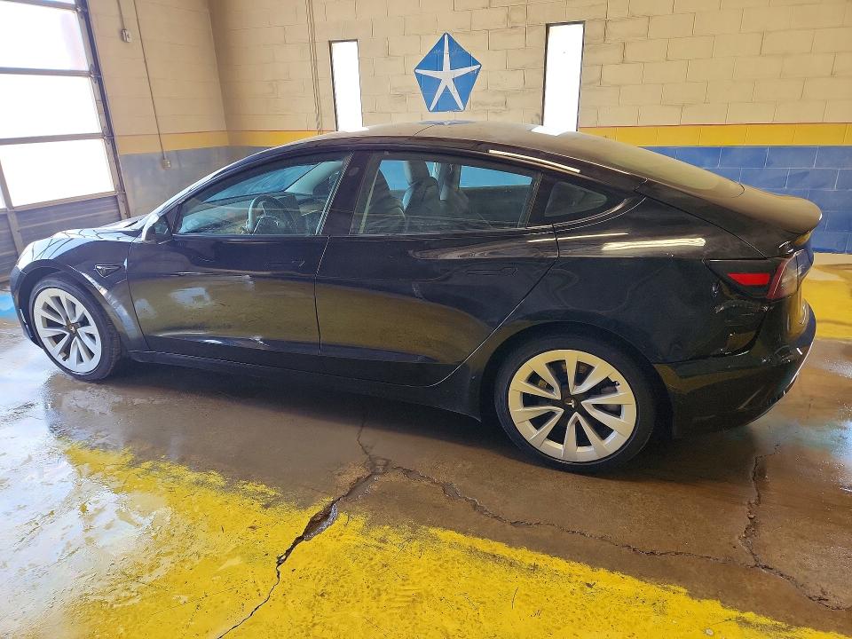 2023 Tesla Model 3 VIN 5YJ3E1EA7PF437527 COPART salvage auction — REAR END, In - Certificate Of Title, sold $9,200 on 2026-07-06 (photo 2)