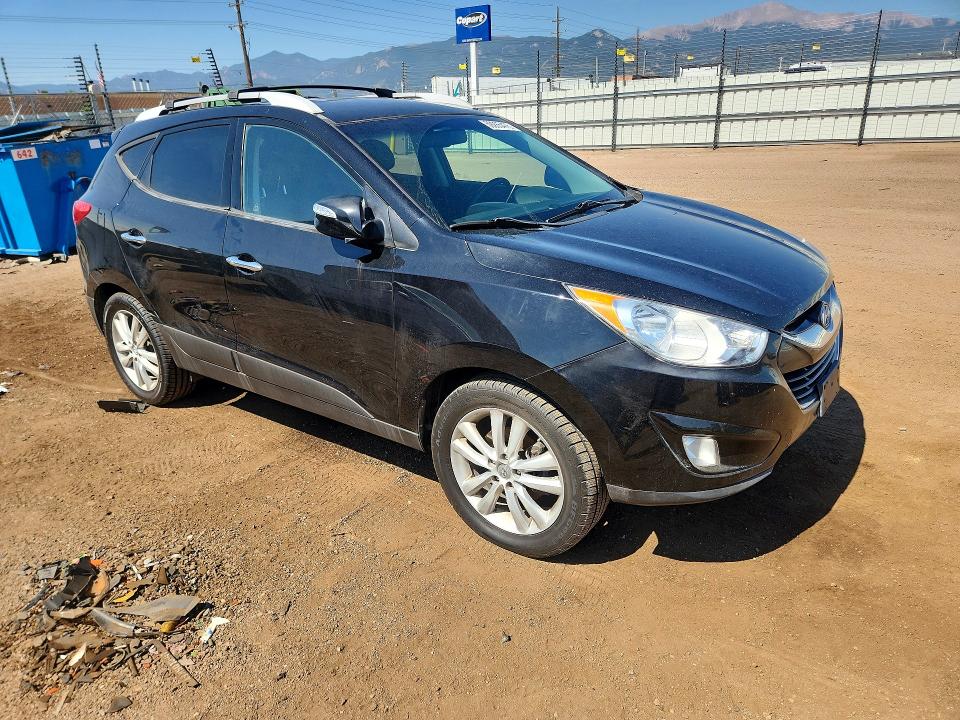 2013 Hyundai Tucson VIN KM8JUCAC5DU578964 COPART salvage auction — MECHANICAL, Co - Dis/Dlr/Exp Only Clean Title, sold $1,300 on 2026-07-20 (photo 4)