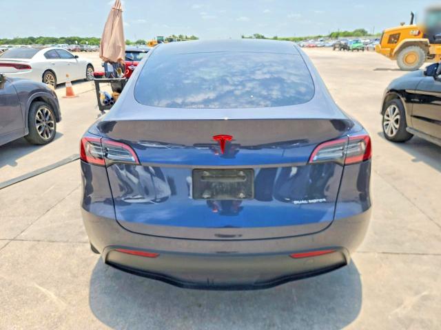 2023 Tesla Model y VIN 7SAYGDEE3PA075300 COPART salvage auction — SIDE, Tx - Salvage Vehicle Title, sold $8,100 on 2026-07-27 (photo 6)