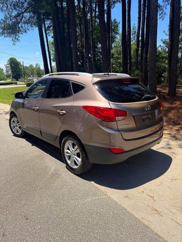 2010 Hyundai Tucson VIN KM8JU3AC9AU040098 COPART salvage auction — NORMAL WEAR, Nc - Dealer Only Clean Title (P), sold $850 on 2026-07-02 (photo 3)