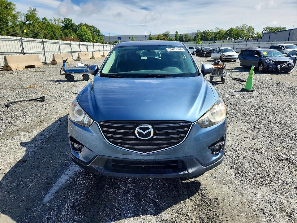 2016 Mazda Cx-5 VIN JM3KE4CY2G0667446 COPART salvage auction — SIDE, Sc - Cert Of Title-Salvage, sold $3,300 on 2026-07-27 (photo 5)