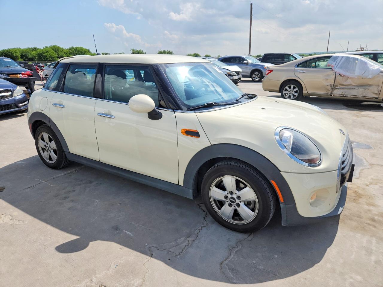 2019 Mini Cooper VIN WMWXU1C51K2J02444 COPART salvage auction — Rear End, TX - SALVAGE VEHICLE TITLE, sold $3,850 on 2026-07-09 (photo 4)