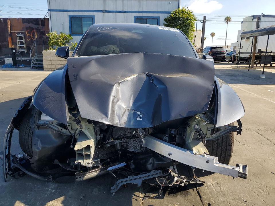2026 Tesla Model y VIN 7SAYGDED0TF386011 COPART salvage auction — FRONT END, Ca - Salvage Certificate, sold $13,600 on 2026-07-31 (photo 5)