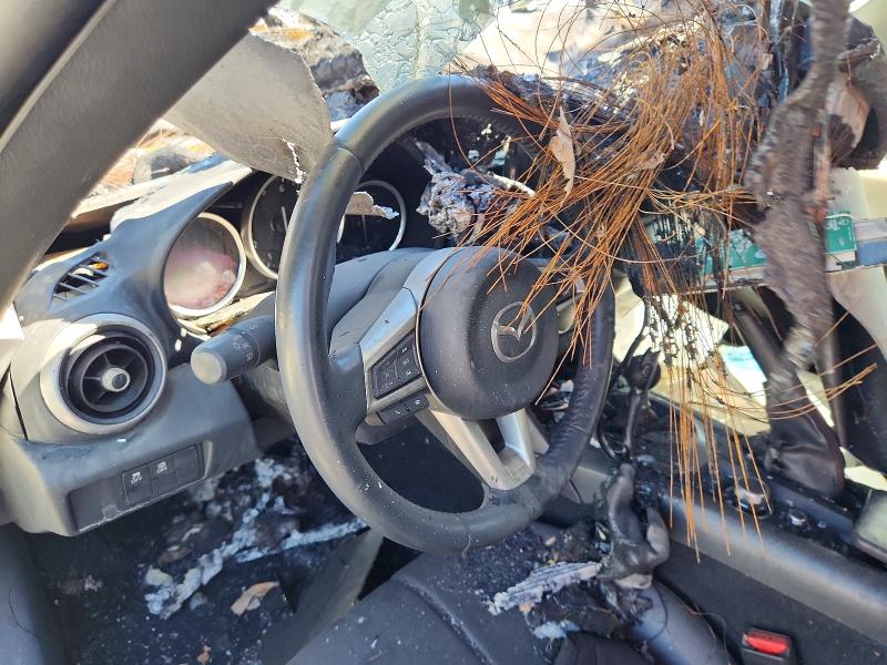 2019 Mazda Mx-5 miata VIN JM1NDAD78K0303683 COPART salvage auction — ENGINE BURN, Or - Salvage Title Certificate, sold $225 on 2026-07-06 (photo 9)