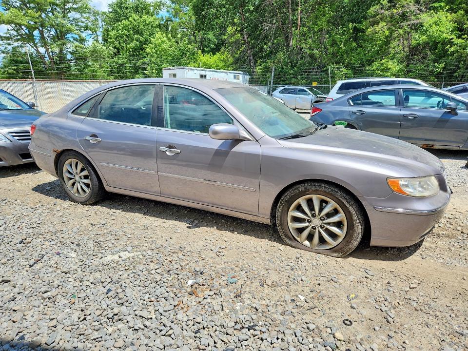 2006 Hyundai Azera VIN KMHFC46FX6A085934 COPART salvage auction — NORMAL WEAR, Oh - Certificate Of Title, sold $450 on 2026-07-29 (photo 4)