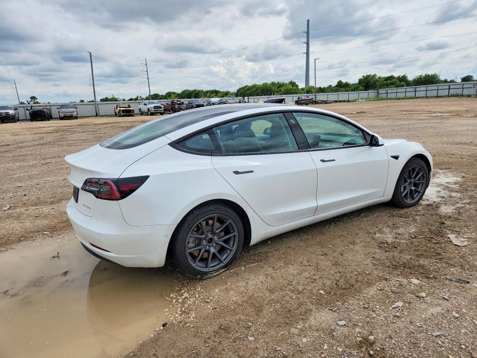 2022 Tesla Model 3 VIN 5YJ3E1EB1NF196263 COPART salvage auction — SIDE, TX - SALVAGE VEHICLE TITLE (P), sold $6,000 on 2026-07-29 (photo 3)