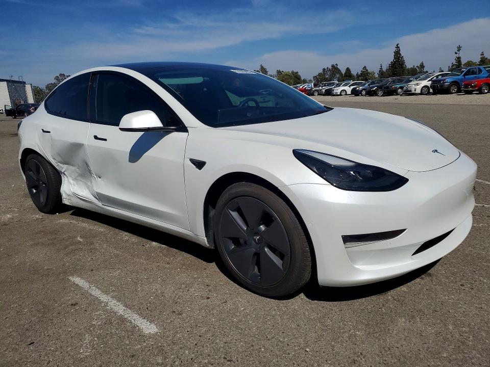 2022 Tesla Model 3 VIN 5YJ3E1EA3NF331458 COPART salvage auction — SIDE, Ca - Salvage Certificate, sold $7,800 on 2026-07-28 (photo 4)