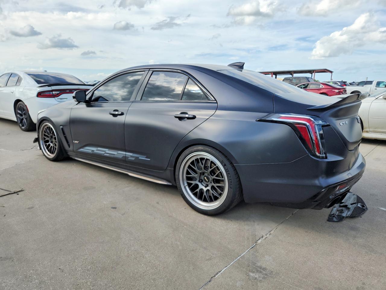 2023 Cadillac VIN 1G6DL5RP8P0566037 COPART salvage auction — Side, TX - SALVAGE VEHICLE TITLE, sold $26,250 on 2026-08-10 (photo 2)
