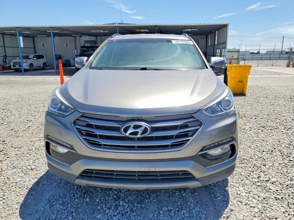 2017 Hyundai Santa fe VIN 5XYZUDLA8HG489910 COPART salvage auction — NORMAL WEAR, MI - DIS/DLR/EXP ONLY CLEAN TITLE, sold $2,650 on 2026-07-09 (photo 5)