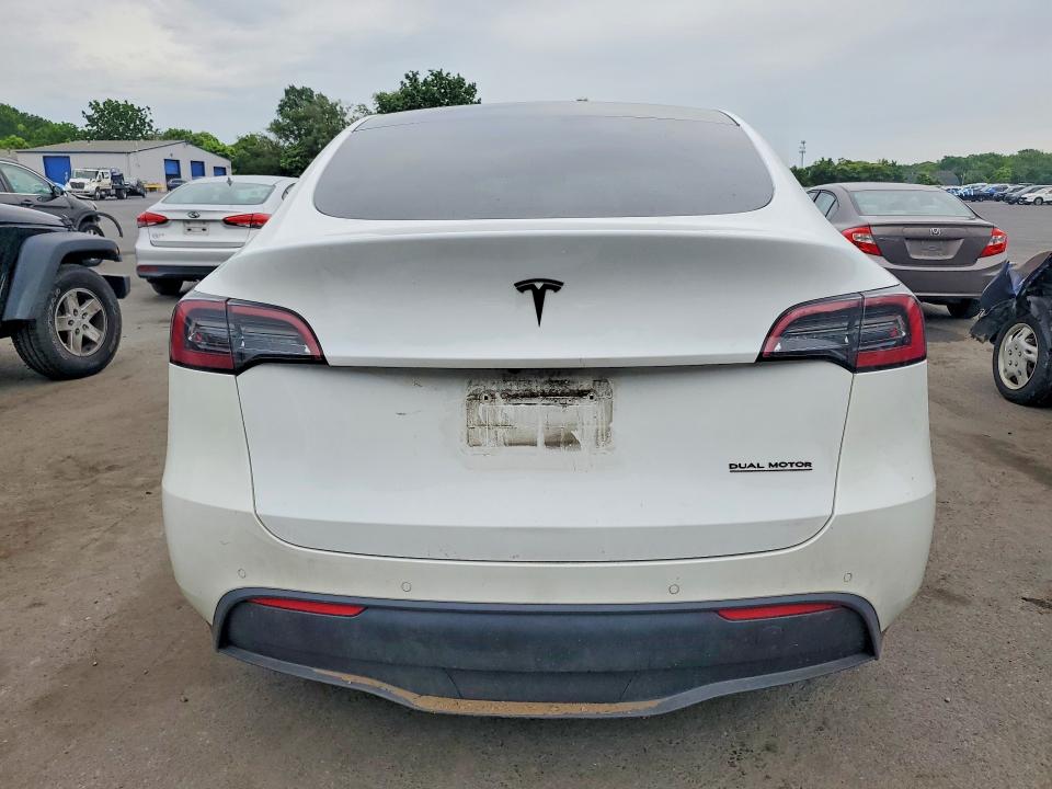 2022 Tesla Model y VIN 7SAYGDEE3NF320922 COPART salvage auction — FRONT END, Id - Salvage Certificate Of Title, sold $1,100 on 2026-09-10 (photo 6)