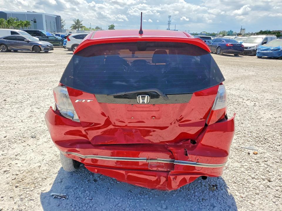 2009 Honda Fit VIN JHMGE88679S058453 COPART salvage auction — REAR END, Fl - Cert Of Title Slvg Rebuildable, sold $600 on 2026-07-10 (photo 6)