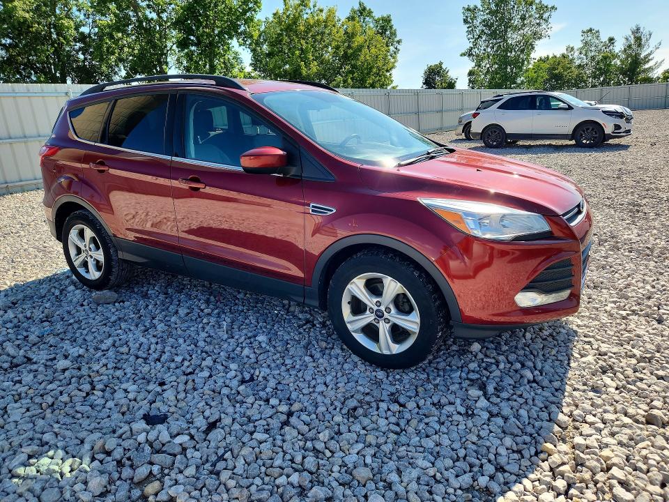 2016 Ford Escape VIN 1FMCU0GX0GUB35885 COPART salvage auction — MINOR DENT/SCRATCHES, MI - DEALER ONLY CLEAN TITLE, sold $525 on 2026-07-02 (photo 4)