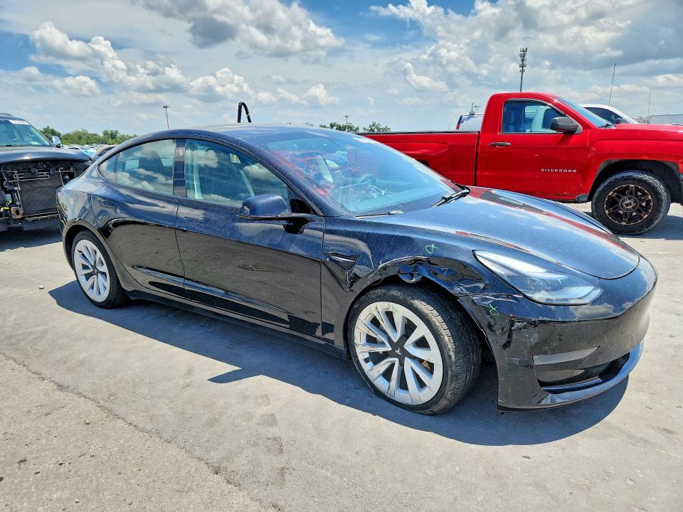 2021 Tesla VIN 5YJ3E1EA1MF023686 COPART salvage auction — FRONT END, FL - CERT OF TITLE SLVG REBUILDABLE, sold $7,100 on 2026-07-15 (photo 4)