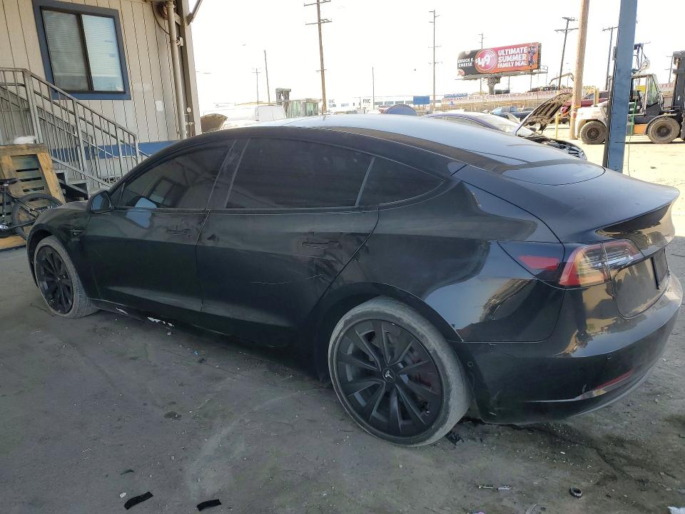 2021 Tesla VIN 5YJ3E1EB9MF089511 COPART salvage auction — VANDALISM, Salvage Title, sold $8,000 on 2026-07-16 (photo 2)
