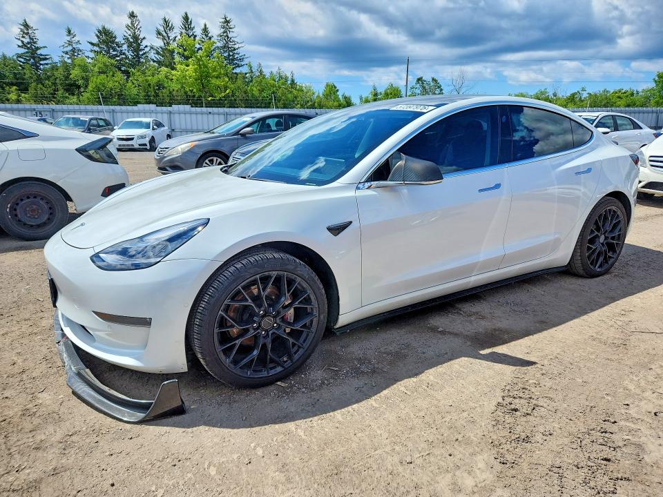 2020 Tesla Model 3 VIN 5YJ3E1EB4LF643200 COPART salvage auction — SIDE, On - Permit No Brand - Unfit, sold $9,200 on 2026-07-02 (photo 1)