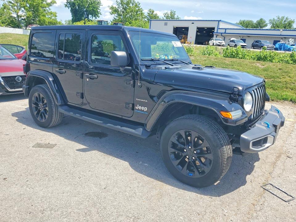2023 Jeep Wrangler / VIN 1C4JJXP68PW553054 COPART salvage auction — MINOR DENT/SCRATCHES, Mo - Certificate Of Title, sold $21,000 on 2026-07-02 (photo 4)