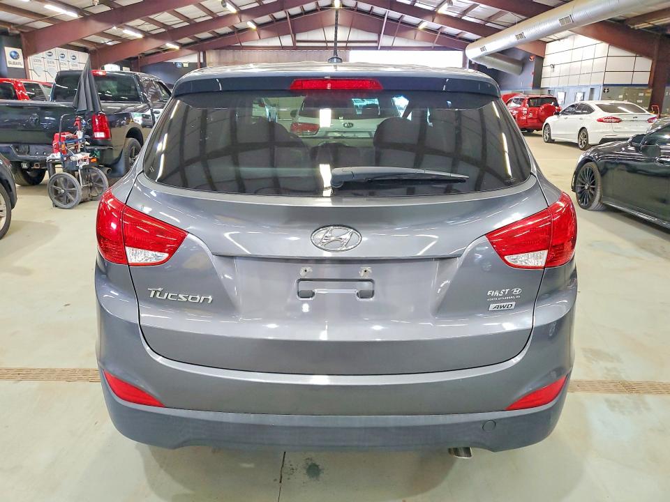2014 Hyundai Tucson VIN KM8JTCAF7EU882795 COPART salvage auction — MINOR DENT/SCRATCHES, Ri - Certificate Of Title, sold $2,600 on 2026-07-02 (photo 6)