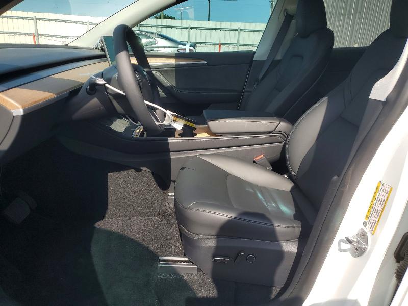 2024 Tesla Model y VIN 7SAYGDED8RA323132 COPART salvage auction — REAR END, Fl - Cert Of Title Slvg Rebuildable, sold $13,400 on 2026-07-20 (photo 7)
