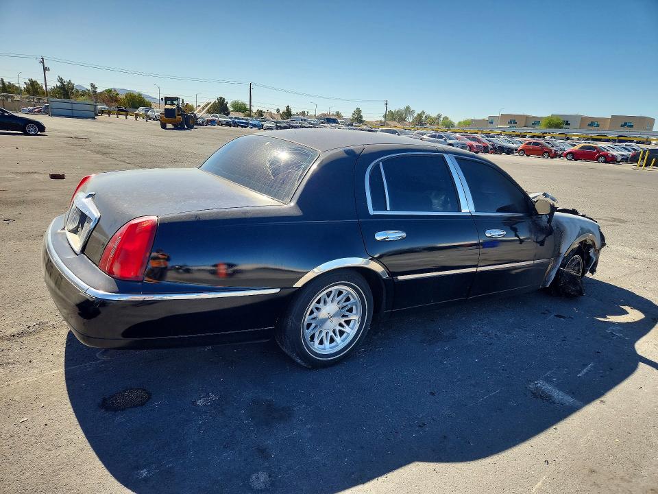 1998 Lincoln TOWN CAR VIN 1LNFM82W9WY669730 COPART salvage auction — ENGINE BURN, Nv - Non-Repairable Vehicle Cert, sold $125 on 2026-07-08 (photo 3)