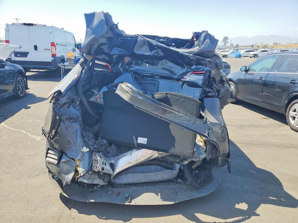 2024 Tesla Model y VIN 7SAYGDEE5RF031434 COPART salvage auction — REAR END, Ca - Salvage Certificate, sold $7,100 on 2026-07-20 (photo 6)