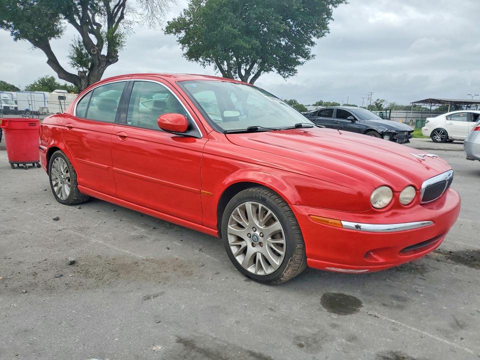 2003 Jaguar X type VIN SAJEA51D83XC92739 COPART salvage auction — REAR END, Fl - Cert Of Title Slvg Rebuildable, sold $10 on 2026-07-21 (photo 4)