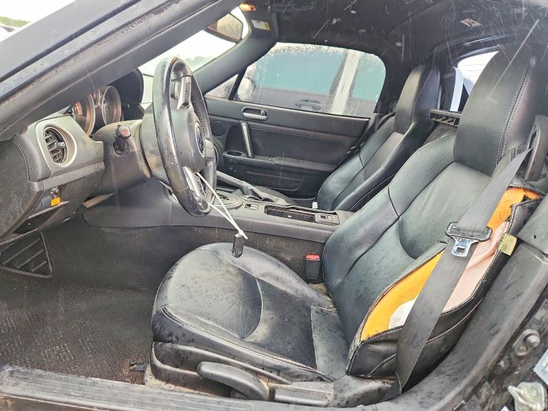2010 Mazda Mx-5 miata VIN JM1NC2FF9A0213034 COPART salvage auction — SIDE, Tx - Salvage Vehicle Title, sold $1,150 on 2026-07-23 (photo 7)