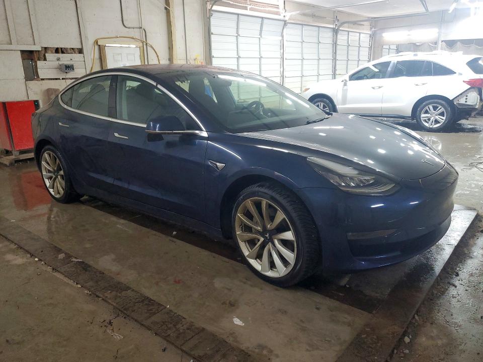 2018 Tesla Model 3 VIN 5YJ3E1EAXJF013699 COPART salvage auction — BURN, Tn - Salvage Certificate, sold $7,100 on 2026-07-07 (photo 4)