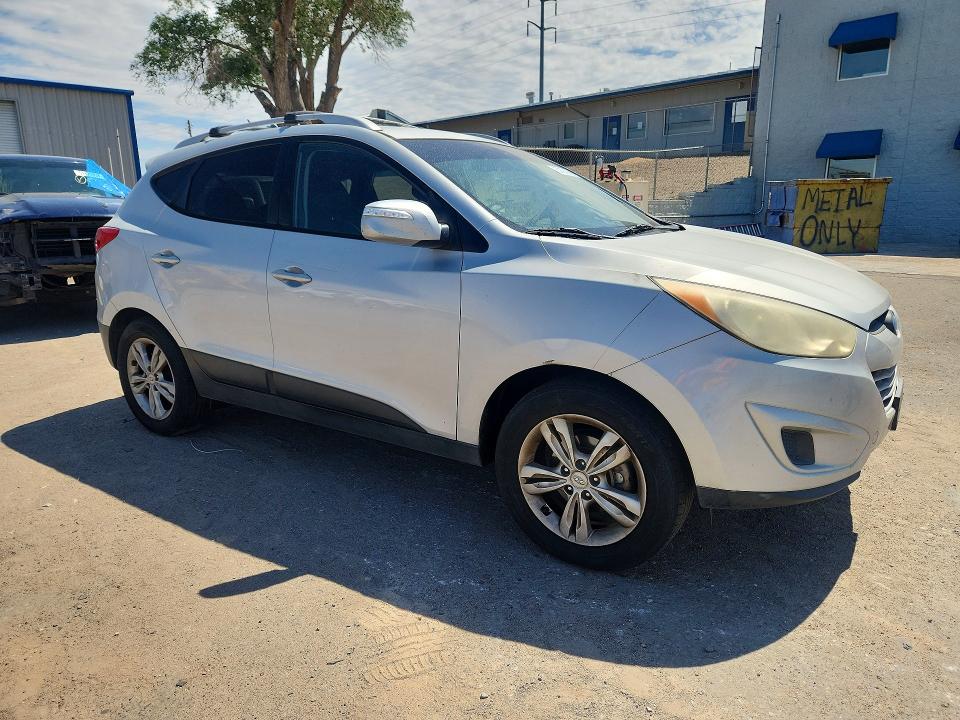 2012 Hyundai Tucson VIN KM8JU3AC2CU521684 COPART salvage auction — NORMAL WEAR, Nm - Certificate Of Title, sold $850 on 2026-07-14 (photo 4)