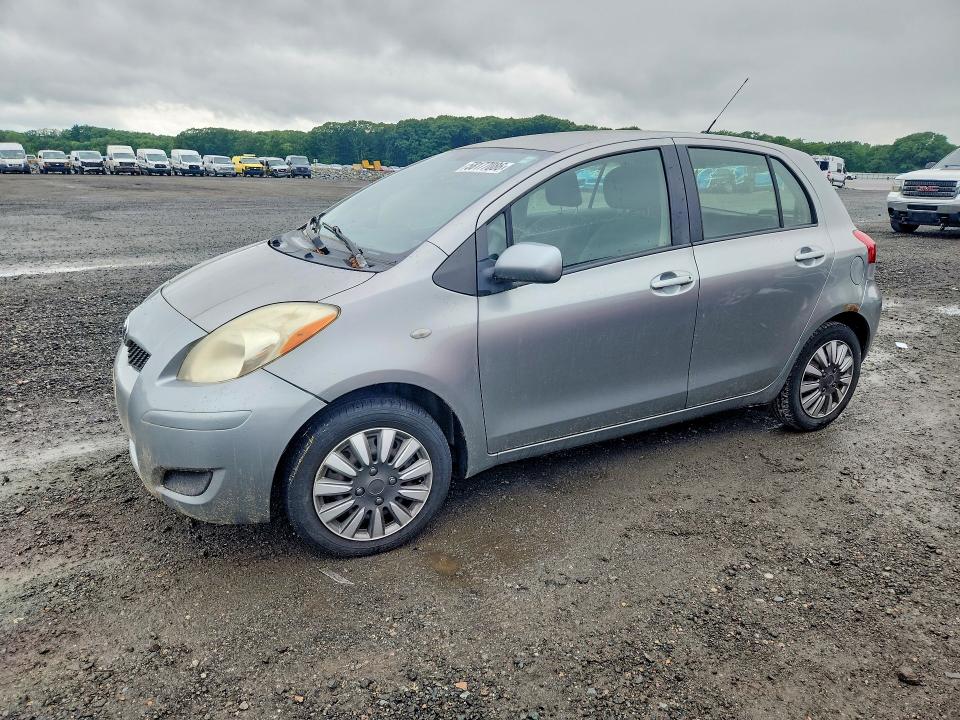 2010 Toyota Yaris VIN JTDKT4K31A5319815 — COPART salvage auction photo