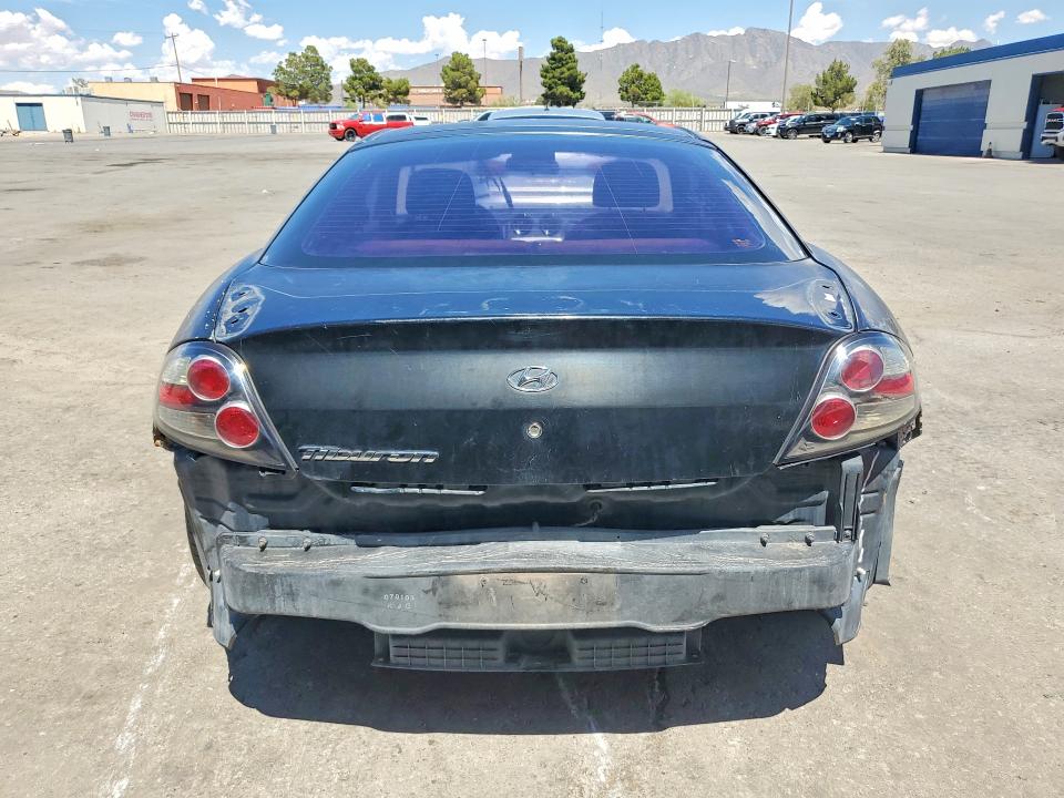 2007 Hyundai Tiburon VIN KMHHM66D17U243934 COPART salvage auction — FRONT END, Tx - Salvage Vehicle Title, sold $275 on 2026-07-10 (photo 6)