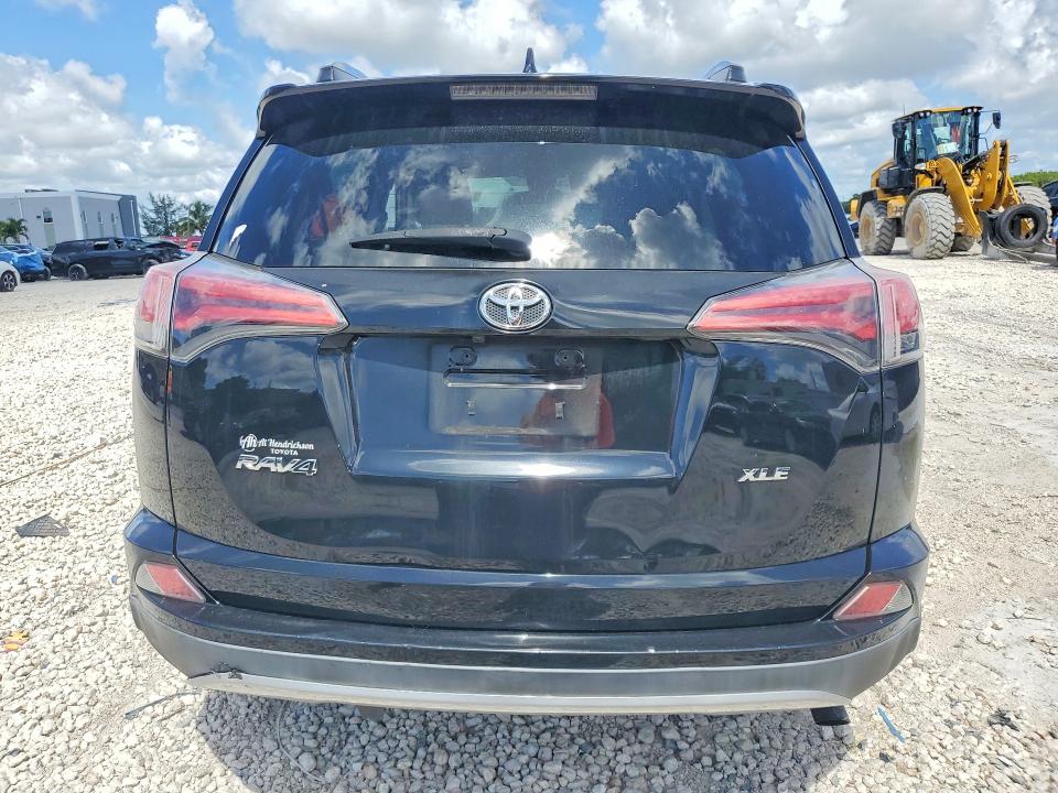 2017 Toyota Rav 4 VIN 2T3WFREV8HW369472 COPART salvage auction — SIDE, Fl - Cert Of Title Slvg Rebuildable, sold $6,400 on 2026-07-02 (photo 6)